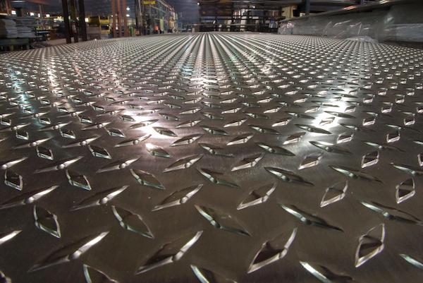 Diamondplate walkway for an industrial yard ramp.