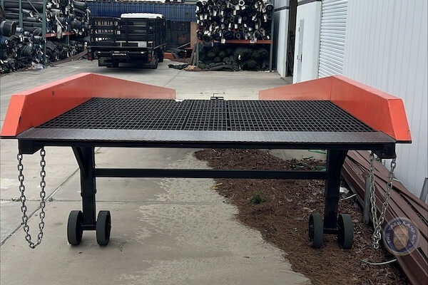 The Yard Ramp Guy's REAL rental inventory Top Apron Deck | UnderCarriage of an industrial yard ramp, from The Yard Ramp Guy's available inventory.